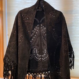 Suede, black fringed, shawl with brass metal accents.